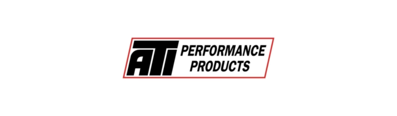 ATI Performance Products' Super Damper harmonic balancer installed in a high-performance engine, showcasing precision engineering and durability.