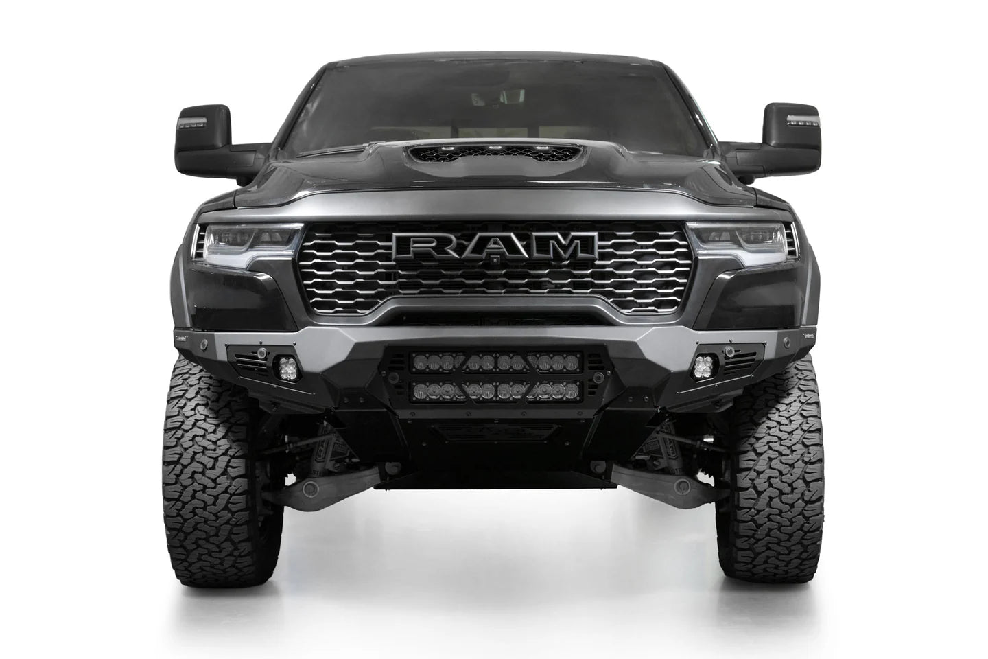 Addictive Desert Designs 25+ RAM 1500 RHO Bomber Front Bumper (20 Inch Lights)