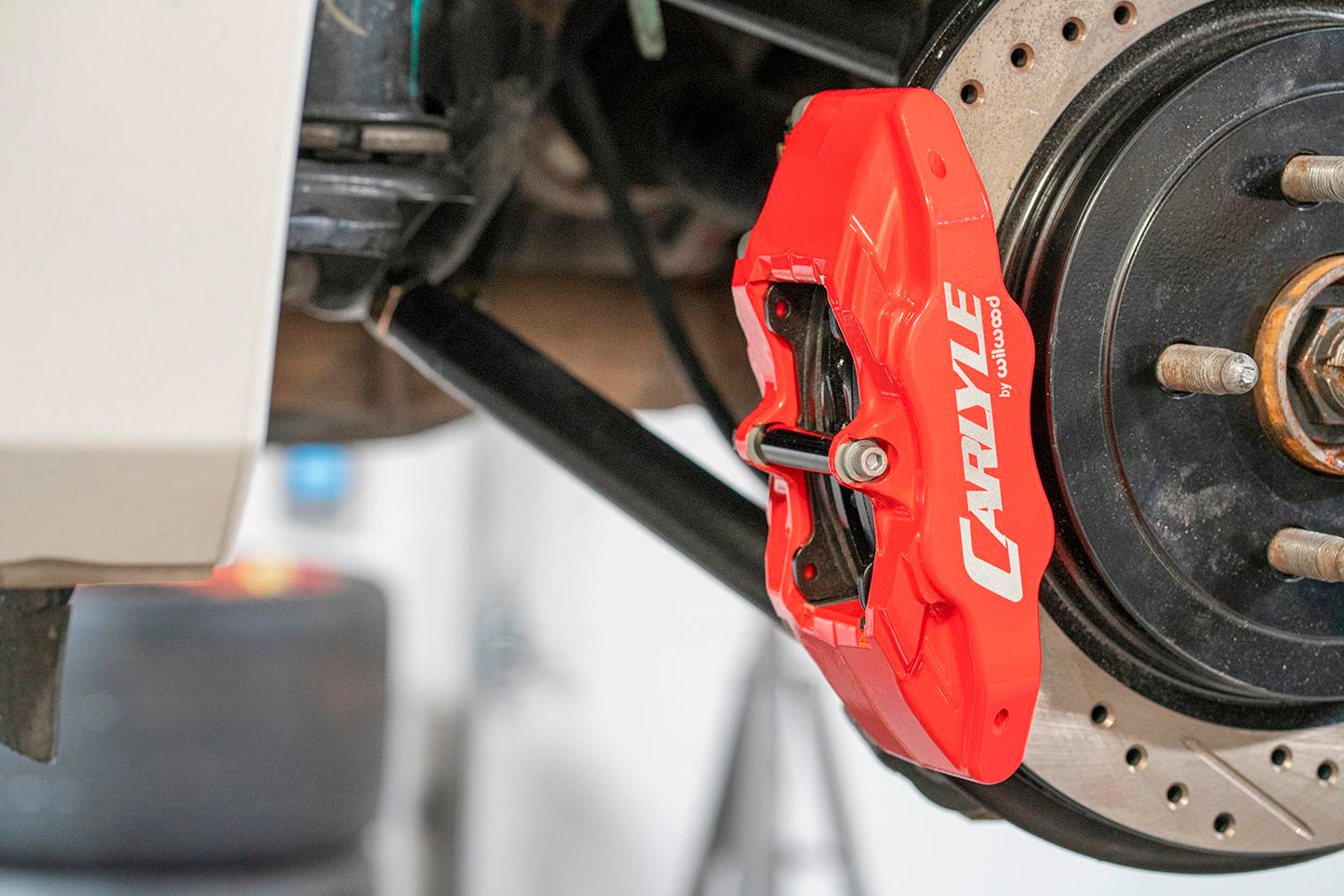 BMR DBK353 15 inch conversion brake kit with drilled slotted rotors and red calipers Camaro CTS-V G8 SS