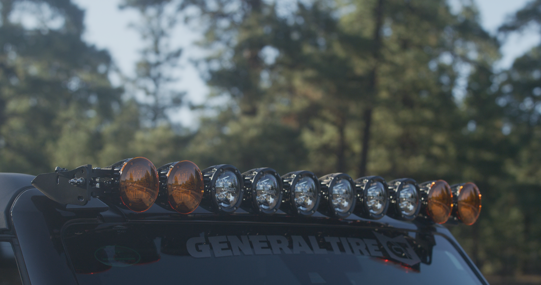 Rigid Industries 360 Connect Light Bar featuring interchangeable 4" RGBW LED pods, mounted on an off-road vehicle.