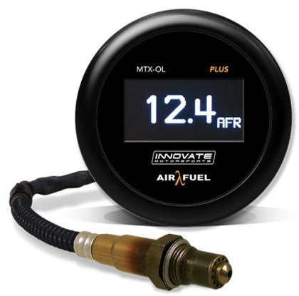 Digital wideband air-fuel ratio AFR gauge mounted in a car interior showing real-time engine tuning data
