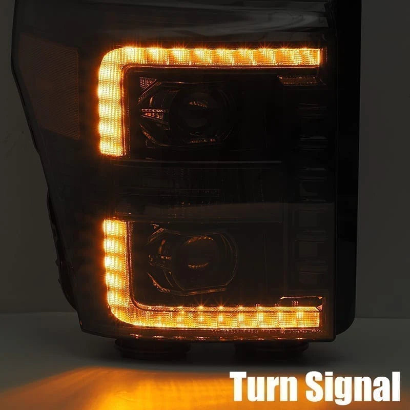 Car headlight with turn signal indicator on a dark background