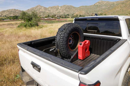 DV8 Offroad Truck Bed Universal Tire Carrier & Accessory Mount