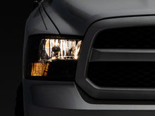 Load image into Gallery viewer, Raxiom 09-18 Dodge RAM 1500 Axial OEM Rep Headlights w/ Dual Bulb- Chrome Housing (Smoked Lens )