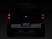 Load image into Gallery viewer, Raxiom 14-18 Chevrolet Silverado 1500 Axial Series LED License Plate Lamps