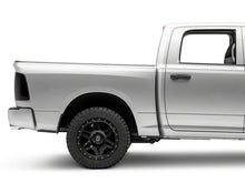 Load image into Gallery viewer, Raxiom 09-18 Dodge RAM 1500/2500/3500 Axial Series LED Tail Lights- BlkHousing- SmokedLens