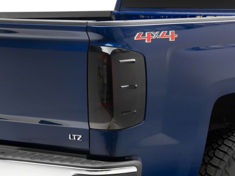 Raxiom 14-18 Chevrolet Silverado 1500 Axial Series LED Tail Lights- Blk Housing (Smoked Lens)