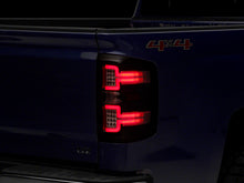 Load image into Gallery viewer, Raxiom 14-18 Chevrolet Silverado 1500 LED Taillights w/ SEQL Turn Signals- Blk Housing (Clear Lens)