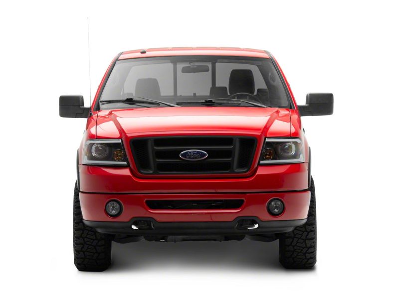 Raxiom 04-08 Ford F-150 Axial Series Projector Headlights w/ SEQL LED Bar- Blk Housing (Clear Lens)