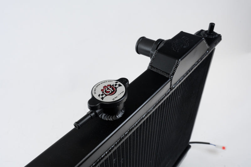 CSF 7075B 1996-2007 Mitsubishi Lancer Evolution (MT)ALUMINUM “Full slim” radiator w/ adjustable -16 or slip-on fittings & 12″ SPAL FAN/shroud - Black CSF