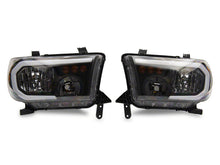 Load image into Gallery viewer, Raxiom 07-13 Toyota Tundra Axial Series Headlights w/ SEQL LED Bar- Blk Housing (Clear Lens)