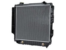 Load image into Gallery viewer, AFE Jeep Wrangler (TJ) 97-06 L4/L6 BladeRunner OER Series Radiator - 46-53101