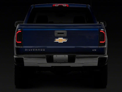 Raxiom 14-18 Chevrolet Silverado 1500 Axial Series LED Tail Lights- Blk Housing (Smoked Lens)