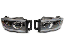 Load image into Gallery viewer, Raxiom 02-05 Dodge RAM 1500/2500/3500 Axial LED Projector Headlights- Blk Housing (Clear Lens)