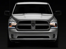 Load image into Gallery viewer, Raxiom 09-18 Dodge RAM 1500/2500/3500 Axial Series Headlights w/ LED Bar- Blk Housing (Clear Lens)