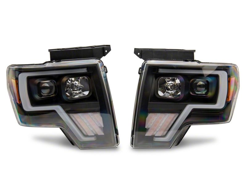 Raxiom 09-14 Ford F-150 Axial G4 Light Bar Switchback Projector Headlights- Blk Housing (Clear Lens)