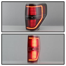 Load image into Gallery viewer, xTune 09-14 Ford F-150 Light Bar LED Tail Lights - Black (ALT-JH-FF15009-LBLED-BK)