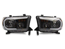 Load image into Gallery viewer, Raxiom 07-13 Toyota Tundra Axial Series Headlights w/ SEQL LED Bar- Blk Housing (Clear Lens)