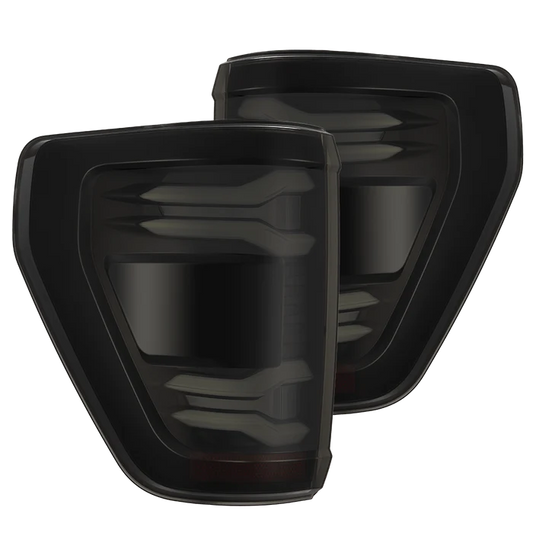 AlphaRex 653018 LUXX-Series LED tail lights for 2024-2026 Ford F-150 and F-150 Raptor with black housing and smoked lenses