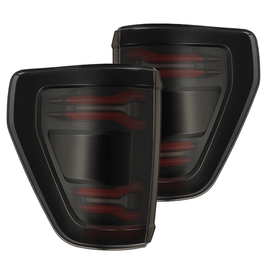 AlphaRex 653038 LUXX-Series LED tail lights for 2024-2026 Ford F-150 and F-150 Raptor with black housing, red LED tubes, and smoked lenses