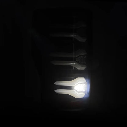 AlphaRex 659091 LUXX-Series LED tail lights for 2017-2022 Ford F-250, F-350 and F-450 without BLIS featuring black housings and smoked lenses