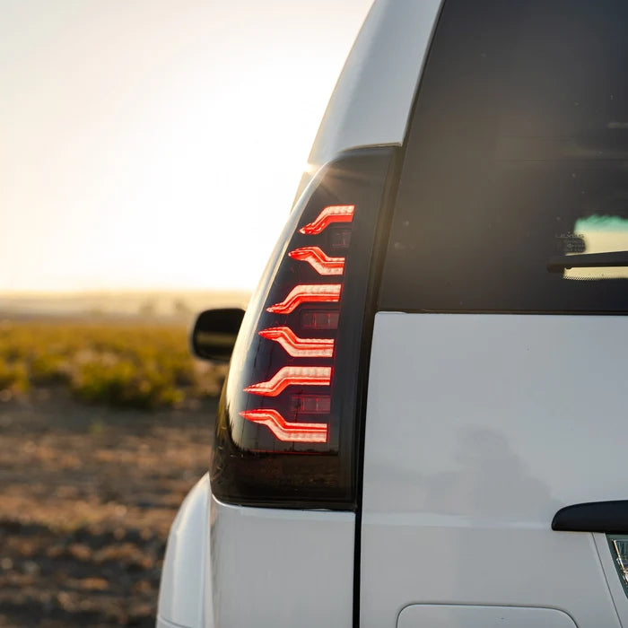AlphaRex 678012 LUXX-Series LED tail lights for 2003-2009 Lexus GX 470 with black housing and clear lenses