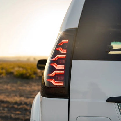 AlphaRex 678012 LUXX-Series LED tail lights for 2003-2009 Lexus GX 470 with black housing and clear lenses