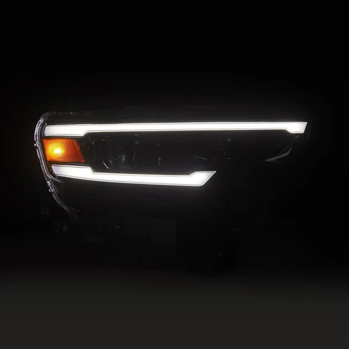 AlphaRex 880906 LUXX-Series LED projector headlights for 2025-2026 Ram 1500 with Alpha-Black housings, selectable white or amber DRLs, and sequential turn signals