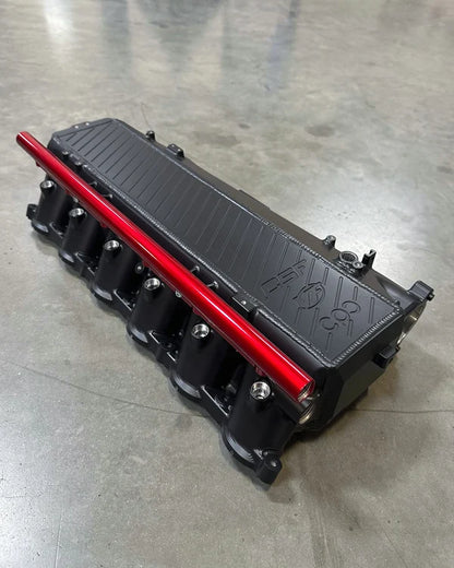 CSF Toyota / BMW B58 Charge-Air Cooler Manifold - Thermal Black w/ Candy Apple Red Fuel Rails
