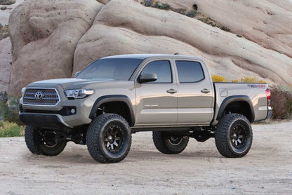 Fabtech 6in Performance Lift System with Dirt Logic 2.5 Reservoir Coilovers and Dirt Logic Rear Shocks for 2016-2021 Toyota Tacoma 2WD/4WD 6-Lug (K7049DL)