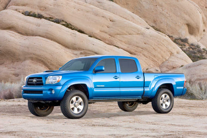 Fabtech 3in Uniball UCA Lift System with Dirt Logic 2.5 Coilovers, Dirt Logic Reservoir Rear Shocks and Rear Spring Pack for 2005-2014 Toyota Tacoma 2WD/4WD 6-Lug (K7064DL)