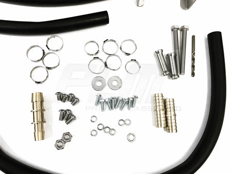 Full view of fittings, hoses, and brackets in PLM Audi cooling system upgrade