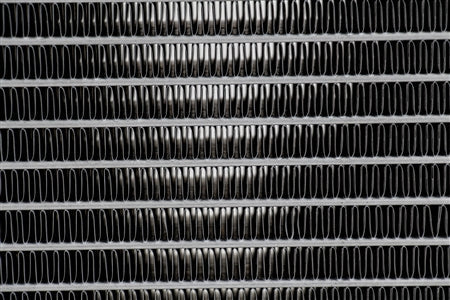 Close-up of high-density fin core and airflow grooves on PLM heat exchanger