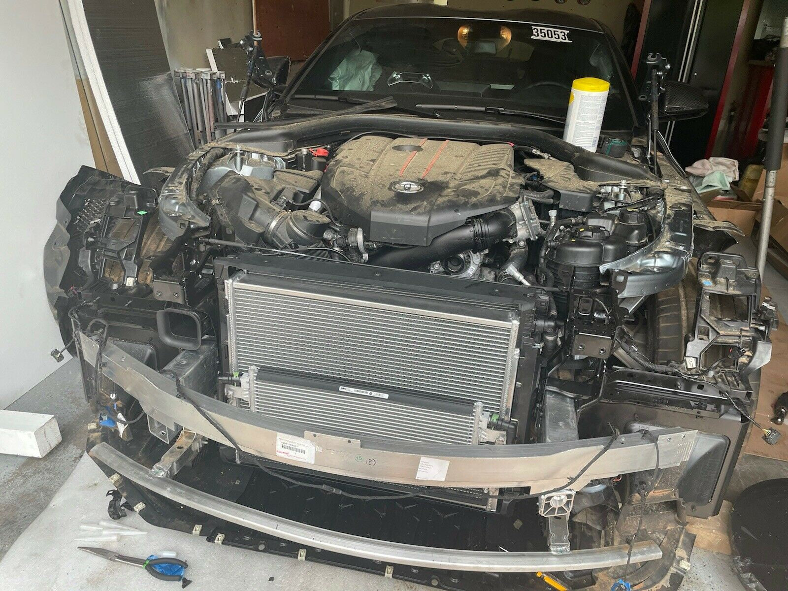 Installed view of PLM heat exchanger in 2020+ Toyota GR Supra engine bay