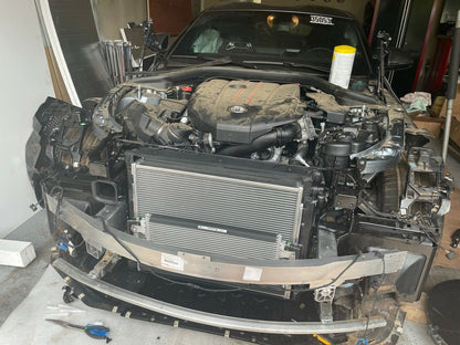 Installed view of PLM heat exchanger in 2020+ Toyota GR Supra engine bay