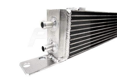 Close-up of ports and fittings on PLM heat exchanger for Mercedes AMG models