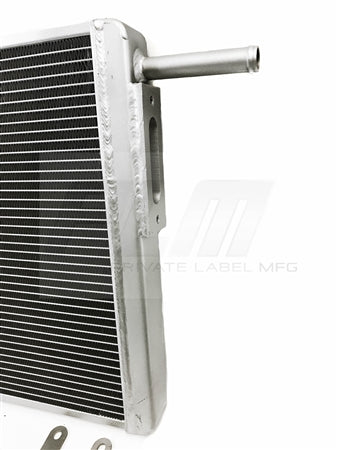 Close-up view of CNC-machined port on PLM heat exchanger for Audi S4