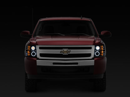 Raxiom 07-13 Silverado 1500 Super White LED Halo Projector Headlights- Black Housing (Clear Lens)