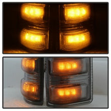 Load image into Gallery viewer, xTune Ford Superduty 08-14 F250-F550 Amber LED Mirror Signal Lens - Smoke ACC-LED-FDSD08-MR-SM SPYDER