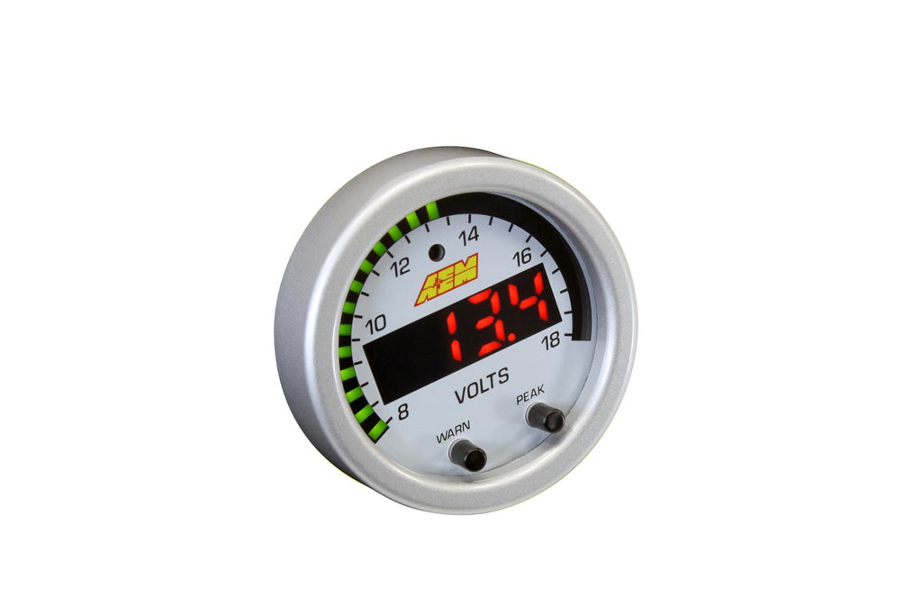 AEM X-Series Voltage Gauge mounted in a high-performance dashboard