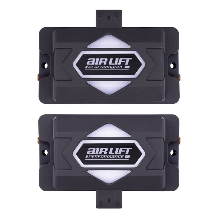 Top down comparison view of two Air Lift Performance ALP4 air management system manifold blocks