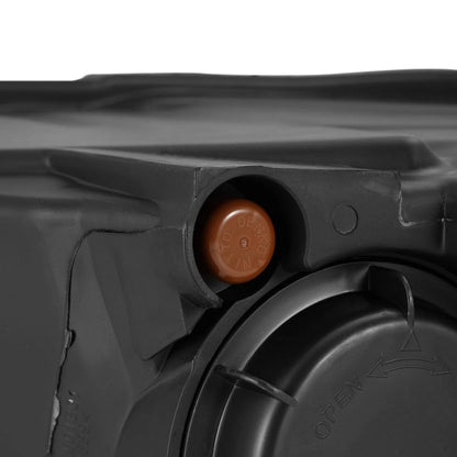 Headlight beam height adjustment screw and breather vent detail on AlphaRex 880560 Ram headlight
