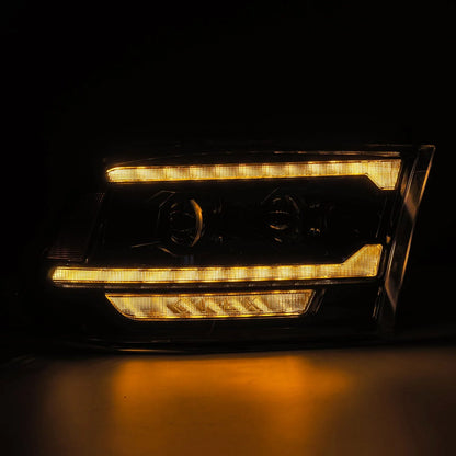 AlphaRex 880560 Ram projector headlights with full amber activation light illuminated