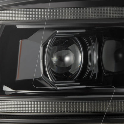 Close up view of LED projector lens and inner housing on AlphaRex 880560 Ram headlight
