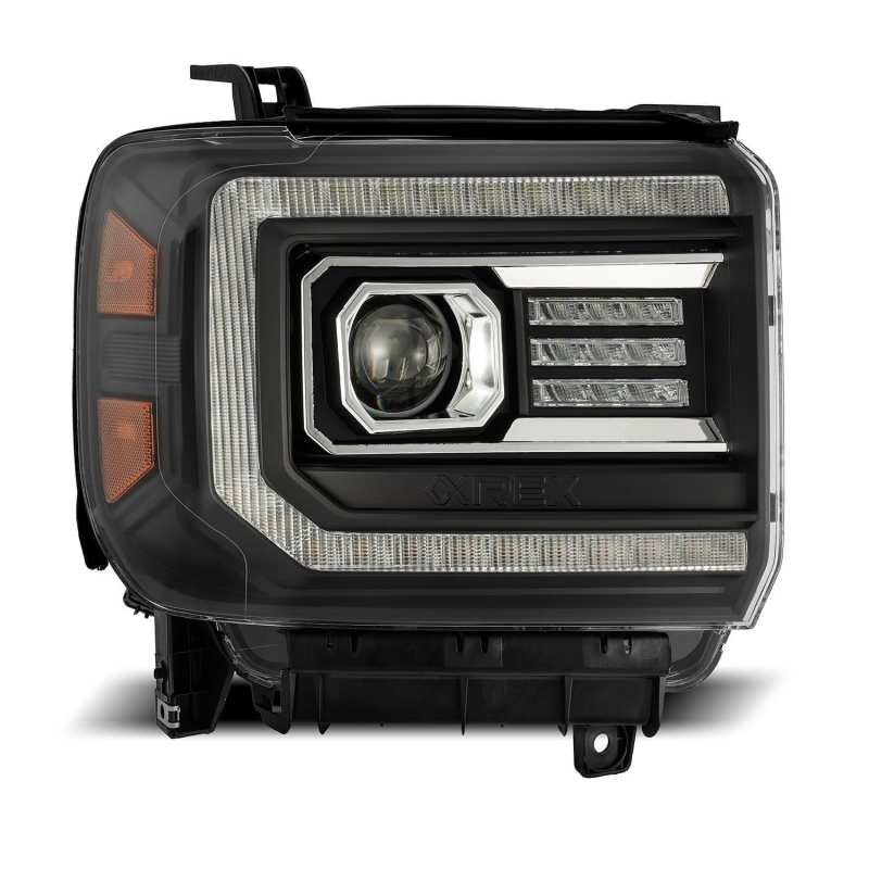 Straight on front housing view of AlphaRex 880615 GMC Sierra LUXX Series black projector headlight