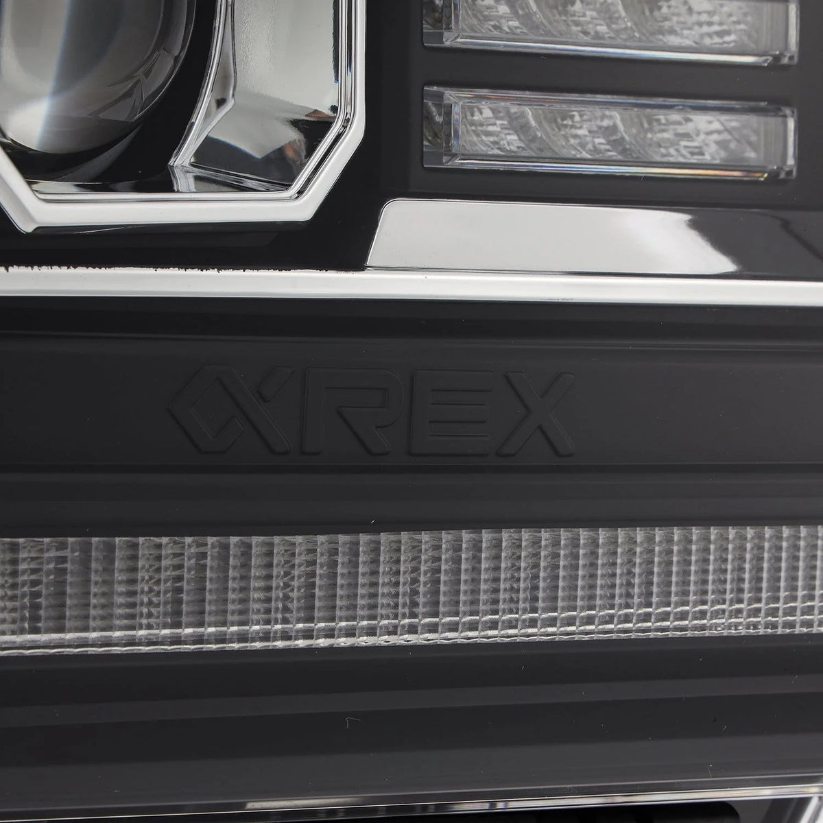 Detail view of inner matte black trim accents and housing structure on AlphaRex 880615 Sierra headlight