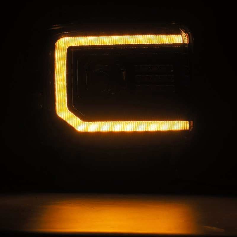 AlphaRex 880615 GMC Sierra LUXX LED headlights showing amber C-shape sequential turn signal mode