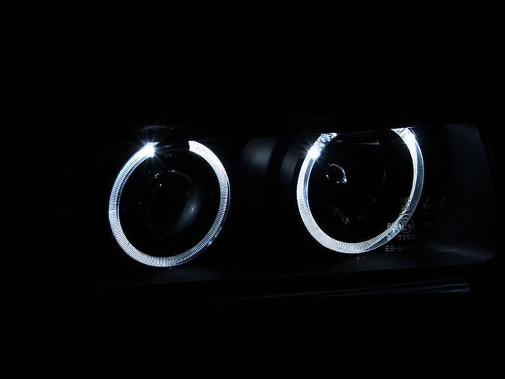 ANZO 121011 Projector Halo Headlights with Black Housing and Clear Lens for BMW 3 Series E36 1992-1998 (2-door models).