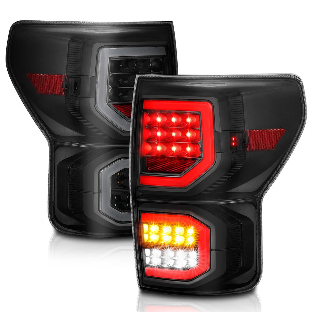 ANZO 311337 LED Tail Lights with Black Housing and Smoked Lens for Toyota Tundra 2007-2013, featuring plank-style design and advanced LED technology.