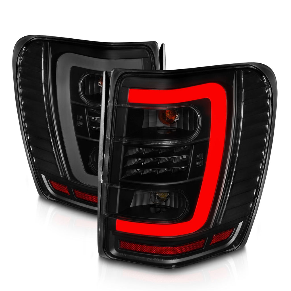 ANZO 311395 LED C-Bar Tail Lights with Black Housing and Smoked Lens for Jeep Grand Cherokee 1999-2004.